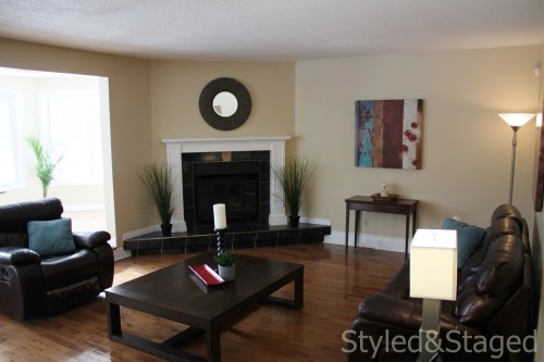 After - the fireplace gets a complete facelift with paint