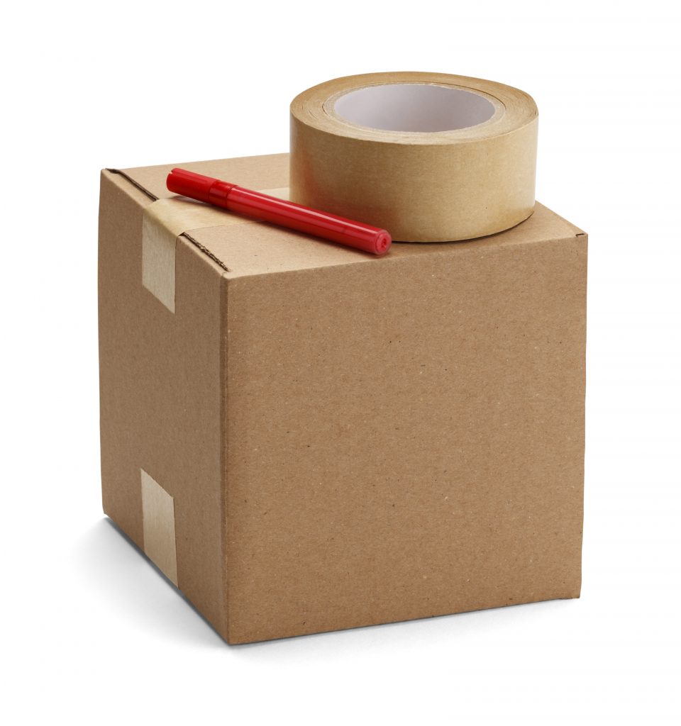 Brown cardboard box with packaging materials isolatedon a white background.